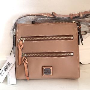 Brand new bag, with tags, original packaging and storage bag.